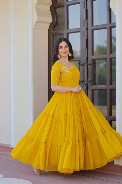 Elegant Yellow Embroidered Tiered Anarkali Gown with Flowy Flared Design